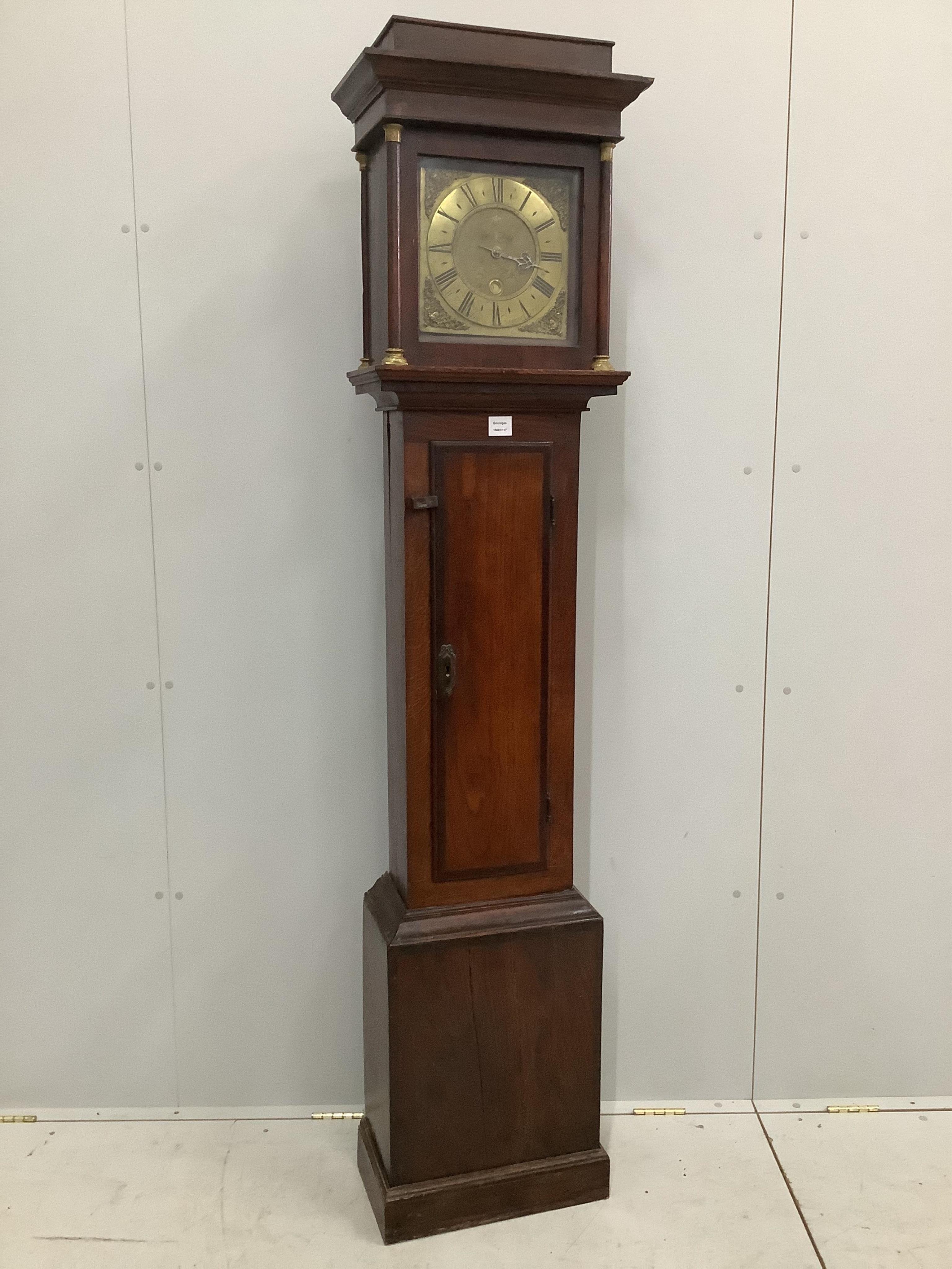 An early 18th century oak and mahogany thirty hour longcase clock, the square brass dial with a single hand, by William Budgen, Reigate, height 200cm. Condition - fair